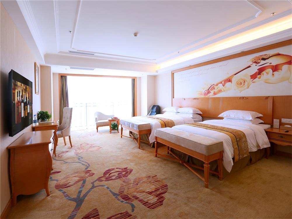 Vienna International Hotel Yantai Changjiang Road Xingyi Square Branch Екстериор снимка