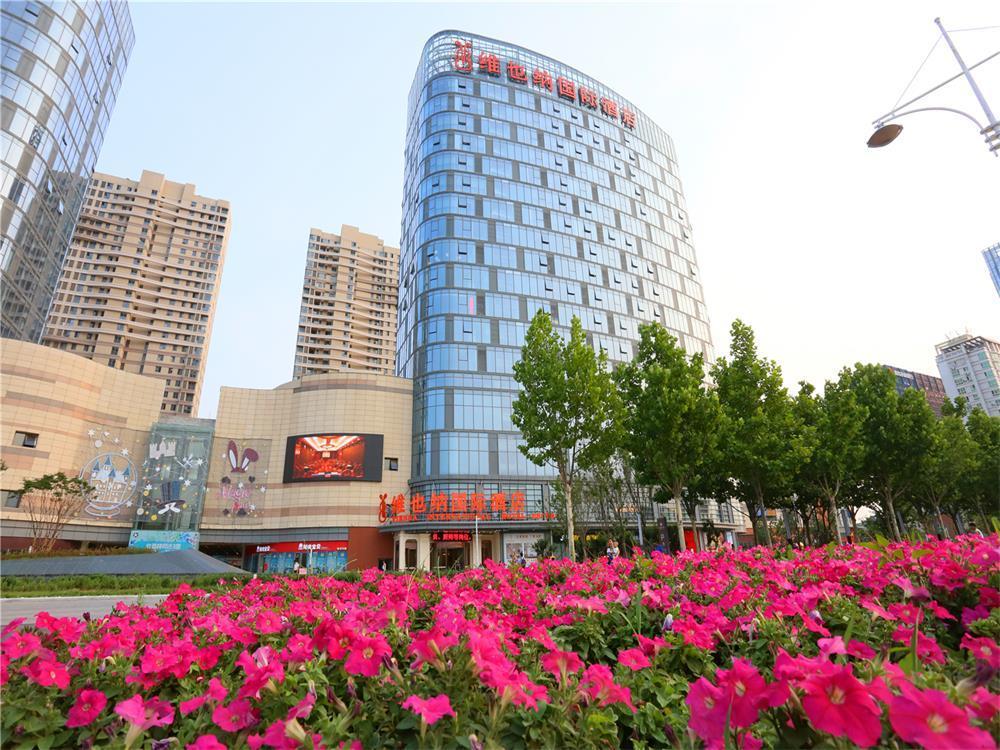 Vienna International Hotel Yantai Changjiang Road Xingyi Square Branch Екстериор снимка