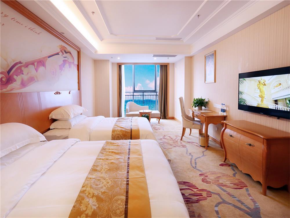 Vienna International Hotel Yantai Changjiang Road Xingyi Square Branch Екстериор снимка